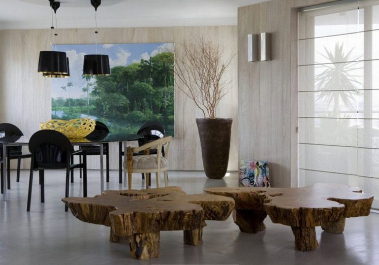в эко стиле очень органично будет смотреться коряга, подобранная в лесу, обработанная и оформленная под журнальный или кухонный столик, или сказочное кресло